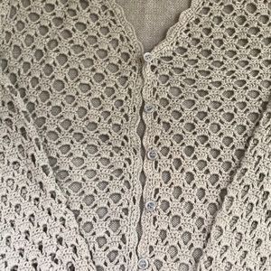 Powder blue crocheted cotton cardigan sweater.